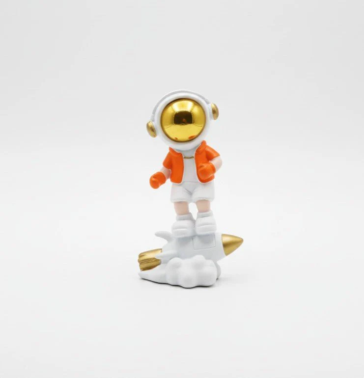 AKDC Mini Ceramic Astronaut Balancing on White & Orange Spaceship Figurine – Creative Space Décor 7.5 cm
